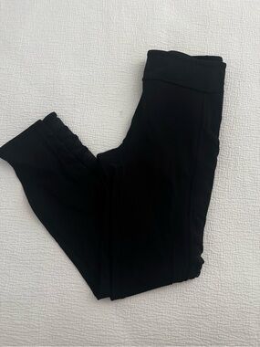 Black Lululemon leggings with sheer on sides